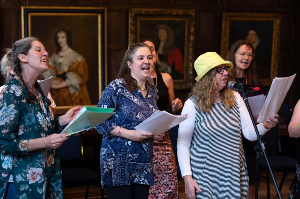 A group of women singing in a choir