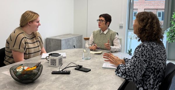 Three women having a discussion